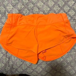 Orange Lululemon hotty hot shorts 2.5 inch size 6